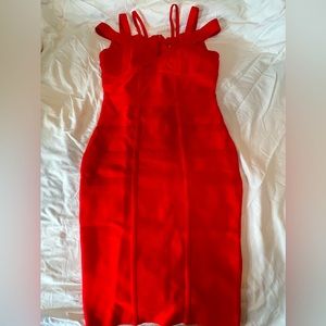 Red bandage women’s dress, new with tags. Minor defeat underneath the left arm.